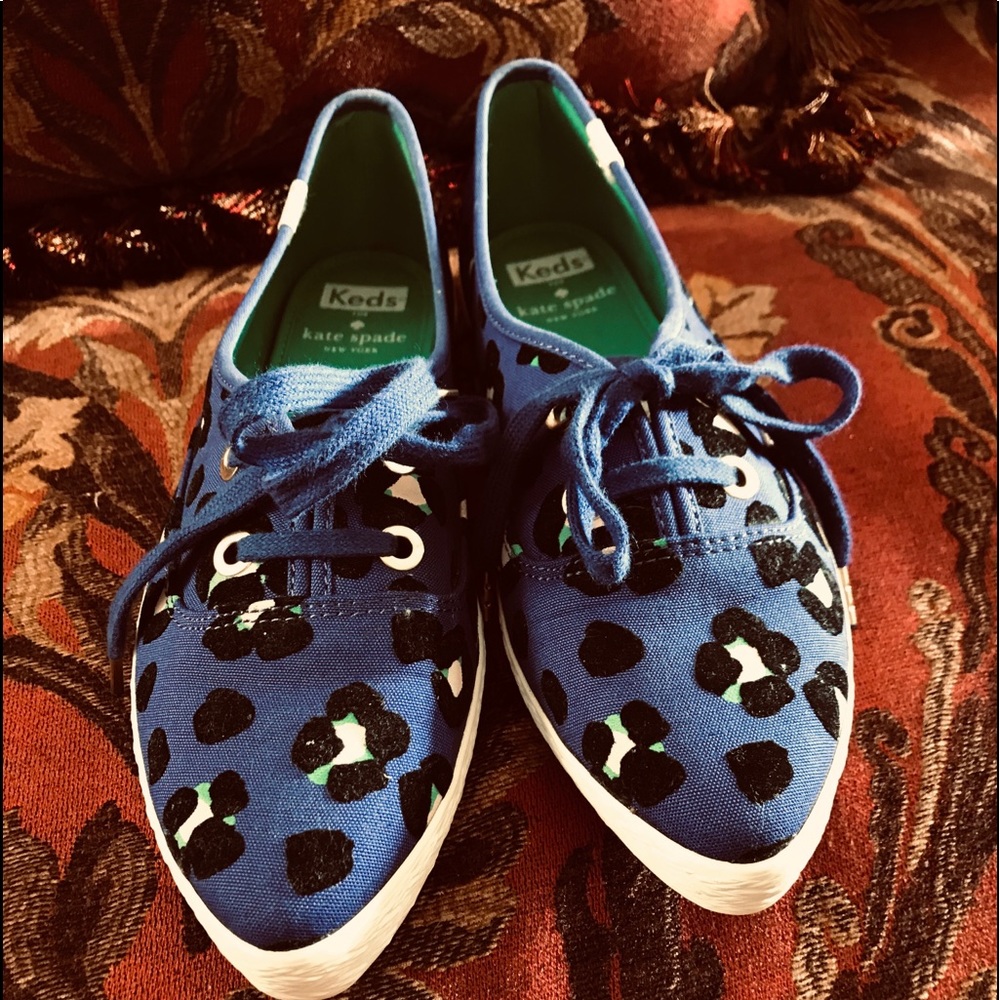 Blue with black spots  lace up keds .